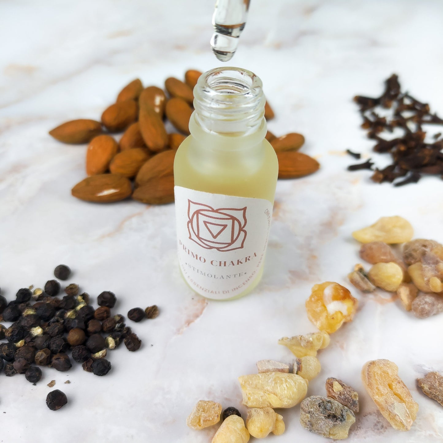 Olio per Massaggi Primo Chakra - Incenso, Pepe, Garofano